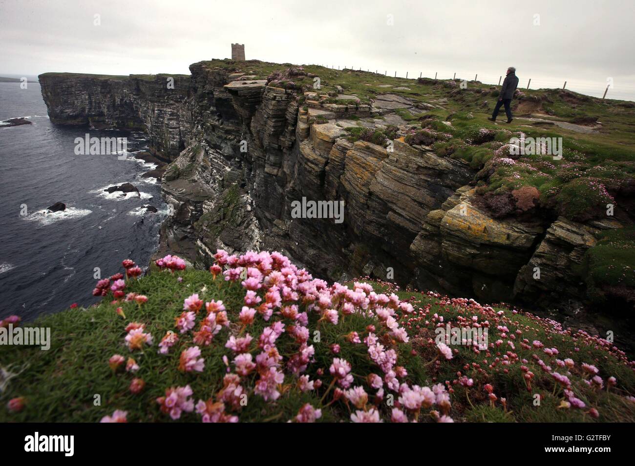 A visitor looks at a tower built to hold the restored Kitchener Memorial, dedicated to Lord Kitchener, at Marwick Head in Orkney, which will be unveiled on Sunday to mark the hundredth anniversary of the sinking of HMS Hampshire. Stock Photo