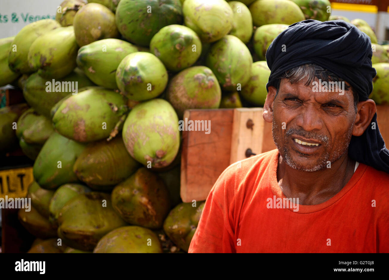 Coconut pile on sale at Indian local Market Stock Photo Alamy