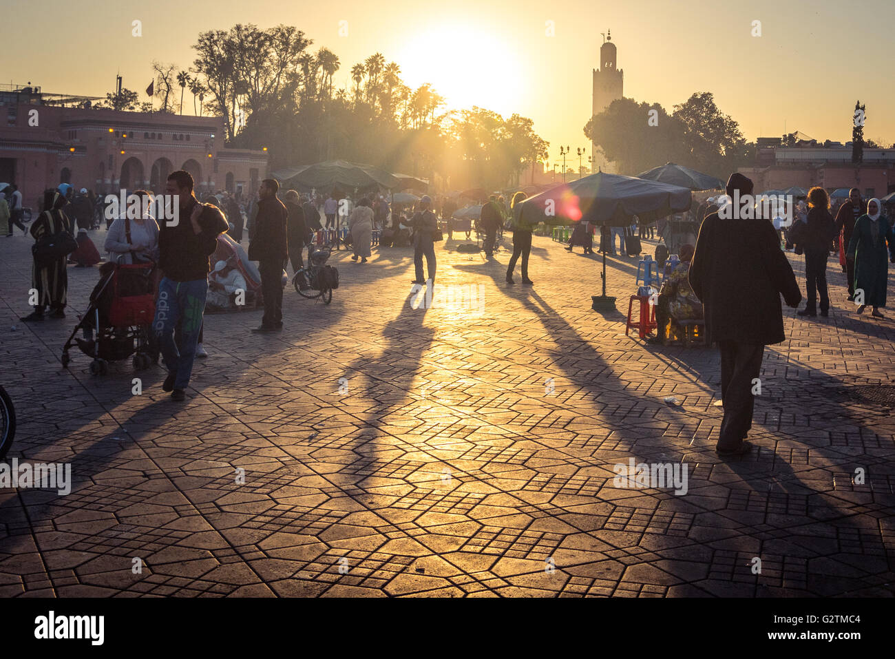Sunset silhouettes in Marrakech, jemaa el fna square, Morocco Stock Photo