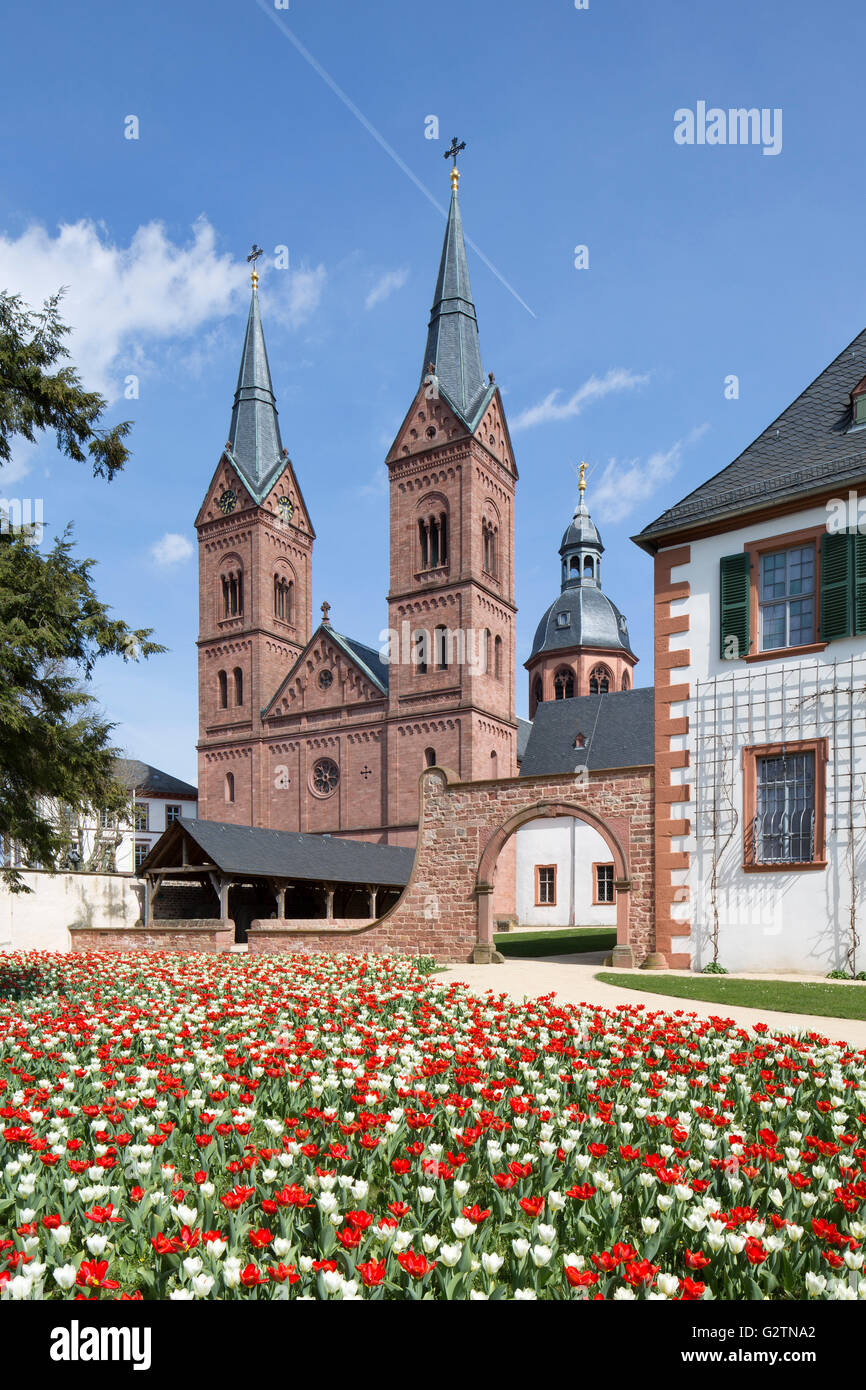 Former Benedictine Abbey with monastery garden and abbey church, Einhard Basilica or Church of St. Marcellinus and Petrus Stock Photo