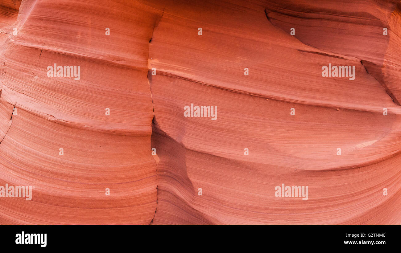 Descending layers of red sandstone walls in a slot canyon of southwest United States. Stock Photo