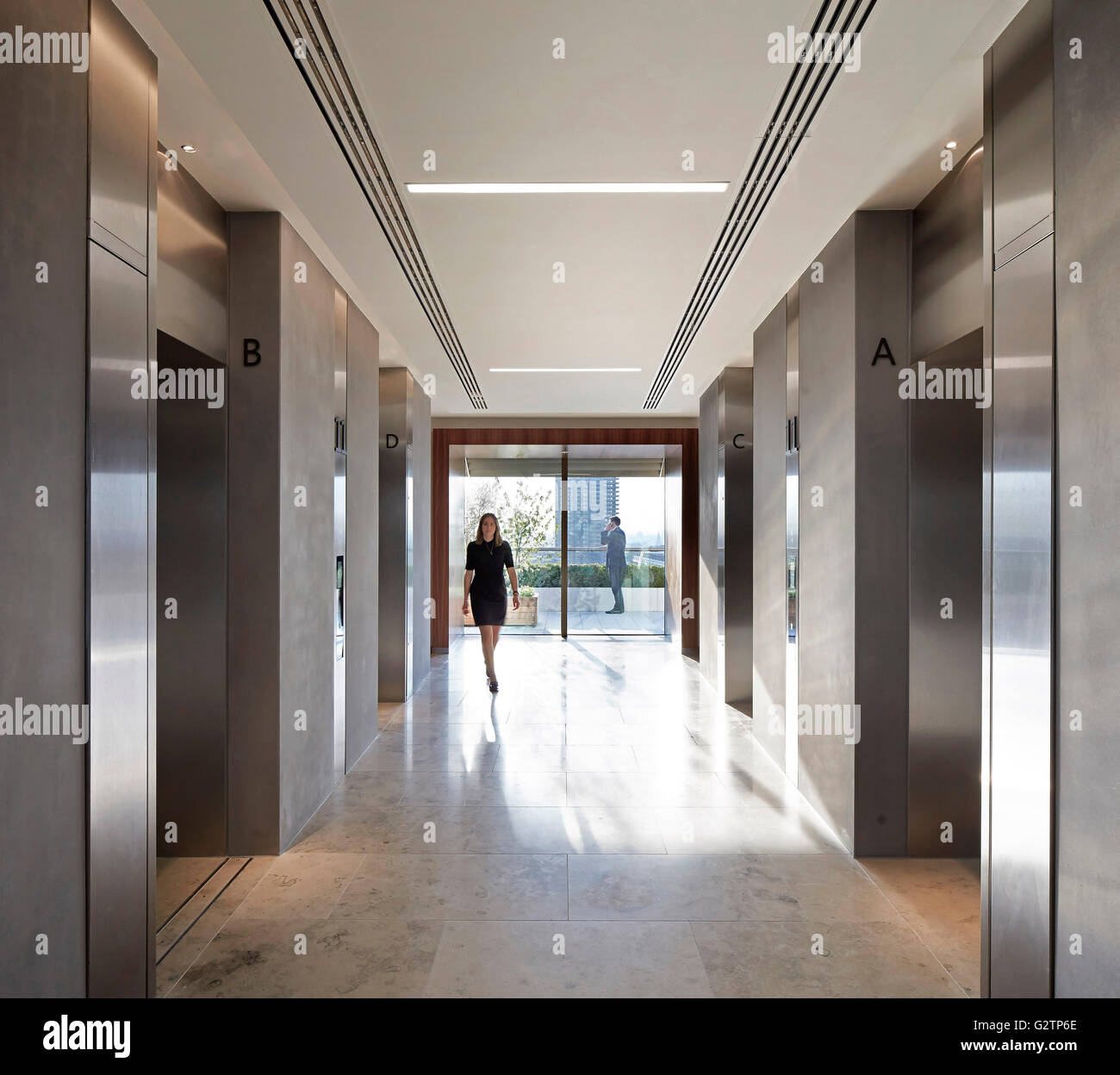 Elevator corridor with view of rooftop terrace. Exchange
