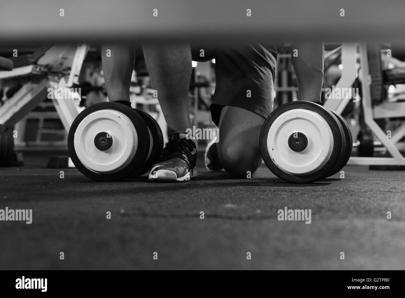 dumbbell exercise weights on the floor Stock Photo Alamy