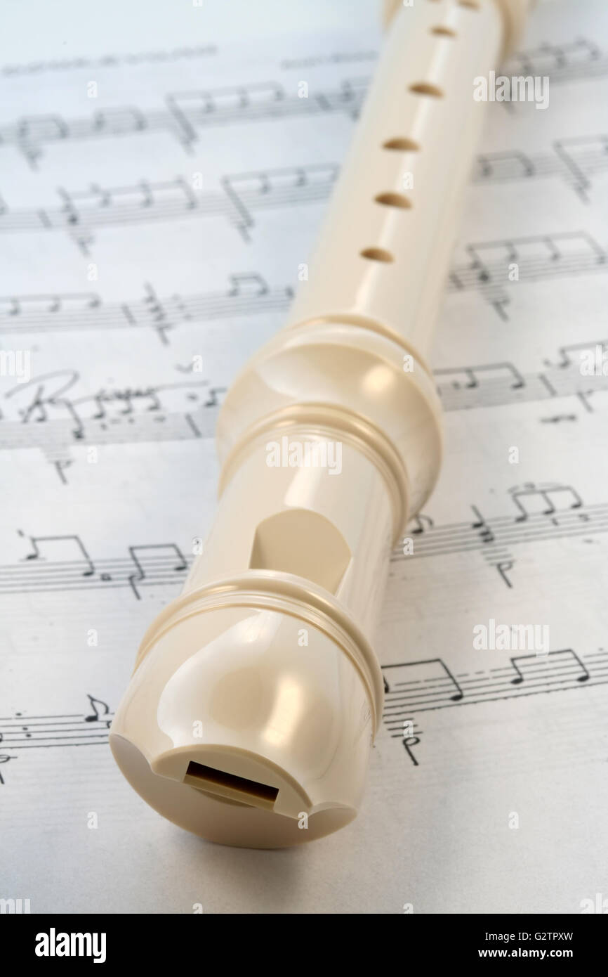 Recorder, music instrument with music notes Stock Photo Alamy