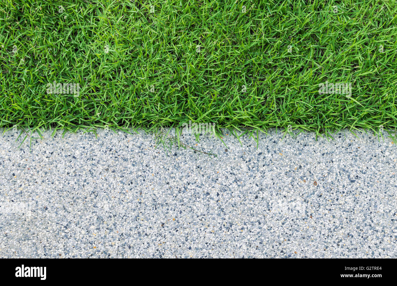 Gravel texture and strip grass as background Stock Photo Alamy