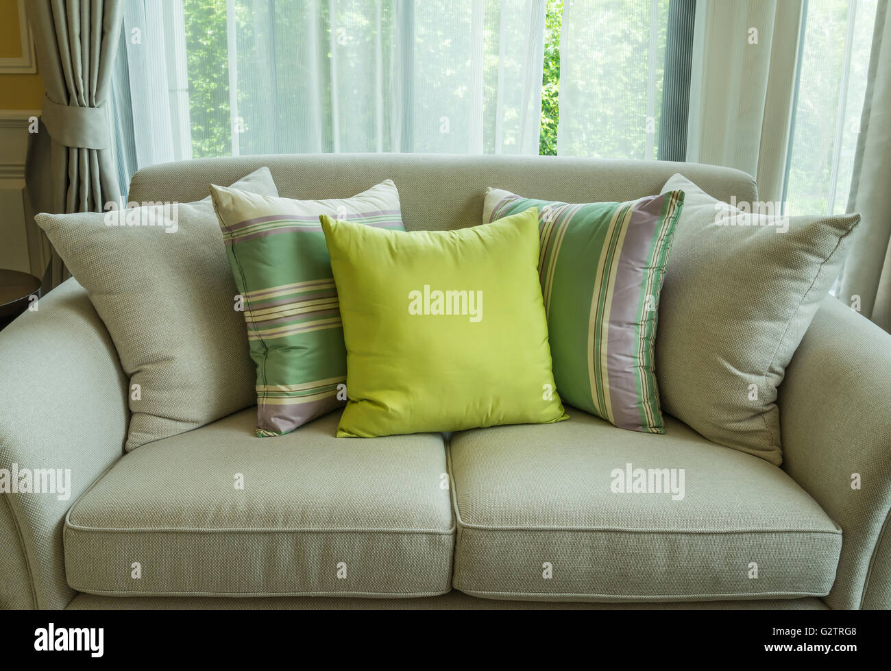 Stock Cuscini.Green Pillows On Modern Sofa In Living Room Stock Photo 105036856