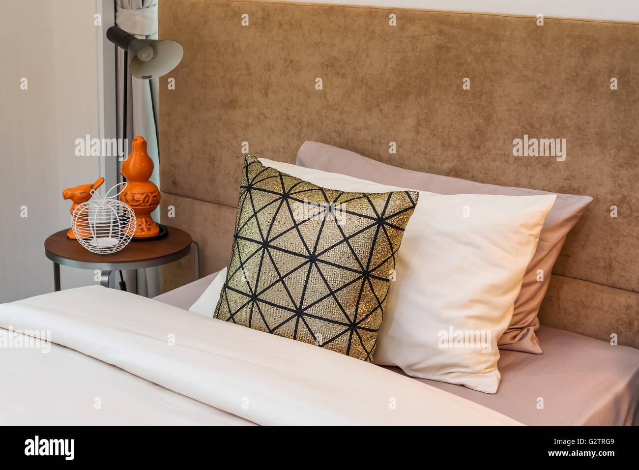 single bed with bedside tables and reading lamp Stock Photo Alamy