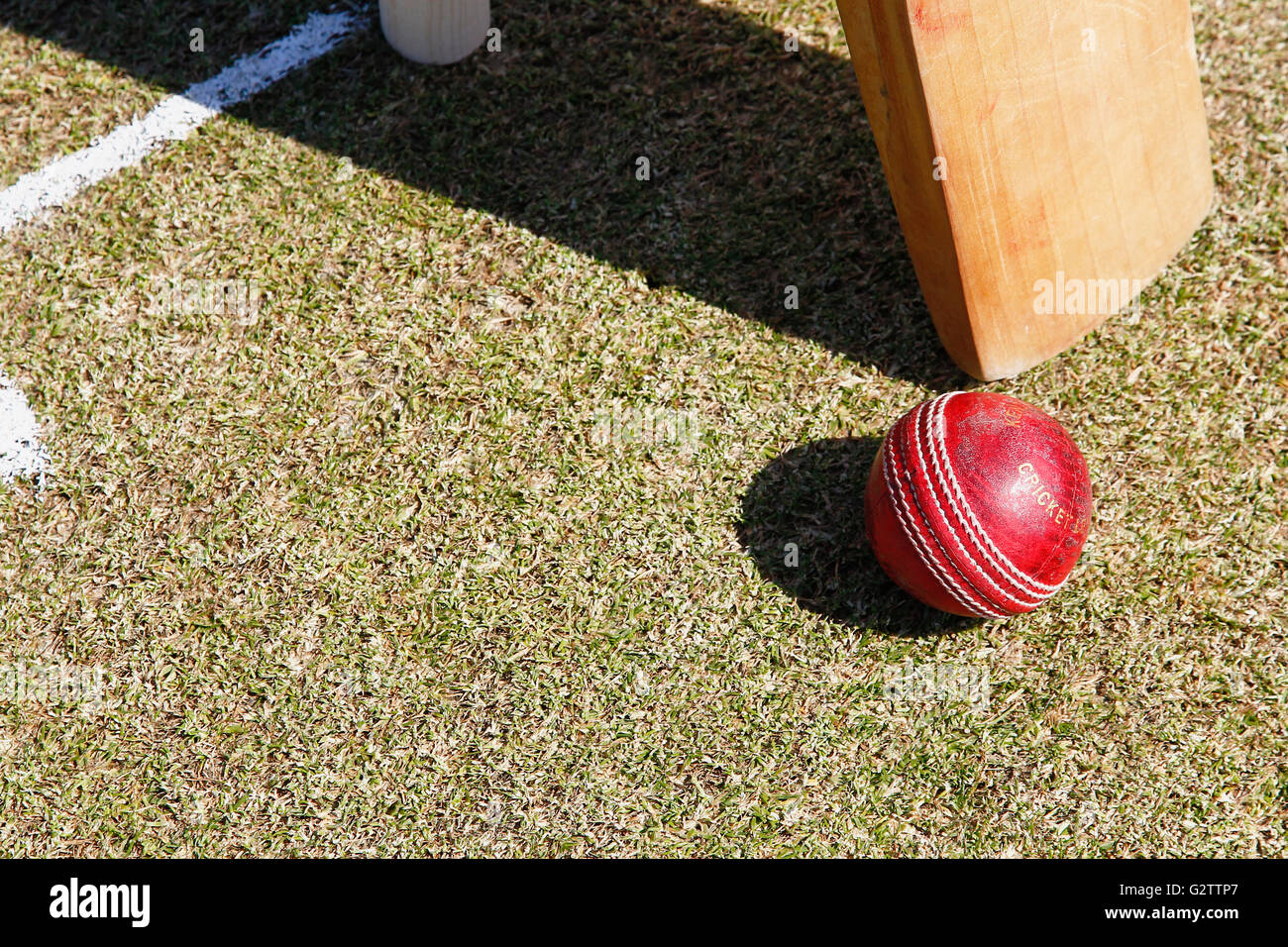 Sport, Ball, Cricket, Bat and ball next to stumps Stock Photo Alamy
