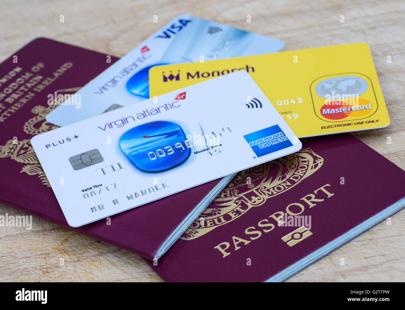 Monarch Airlines prepaid Euro Mastercard, Virgin Atlantic American Express and  Virgin Atlantic VISA  cards and a UK passport Stock Photo