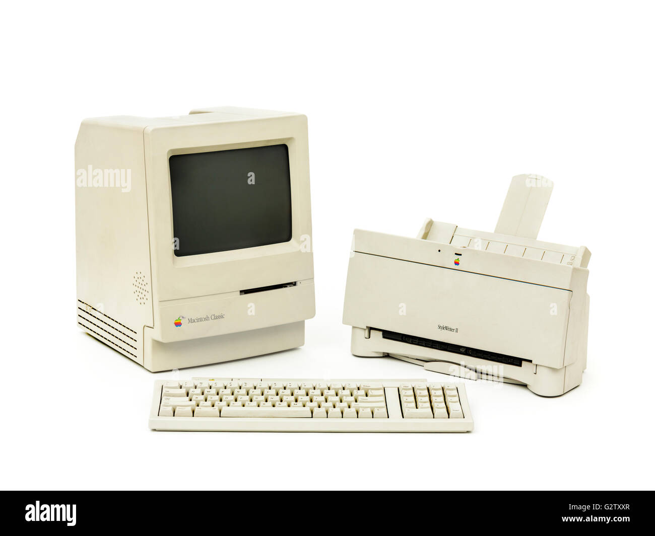 Vintage (1990) Apple Macintosh Classic M0420 computer with keyboard and StyleWriter II printer. Stock Photo