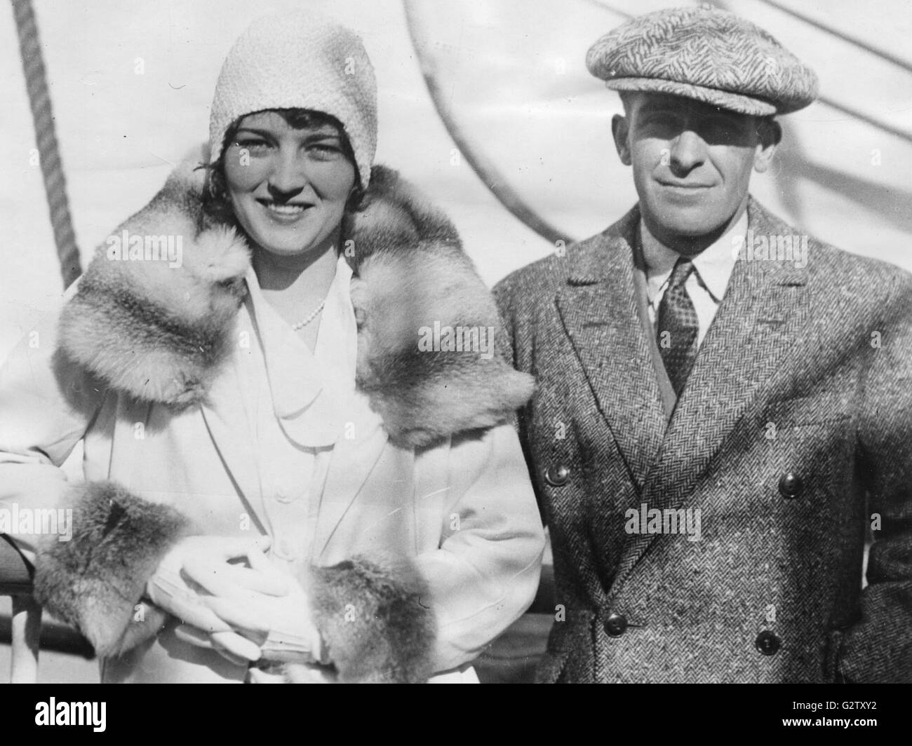 Female Pilot Ruth Elder (left) and her co-pilot Captain George Haldeman (right) photographed on board the SS AQUITANIA returning to the United States from France. Stock Photo