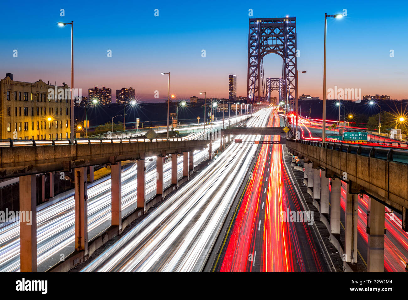 Rush hour traffic with light trails on George Washington Bridge, in New York City Stock Photo