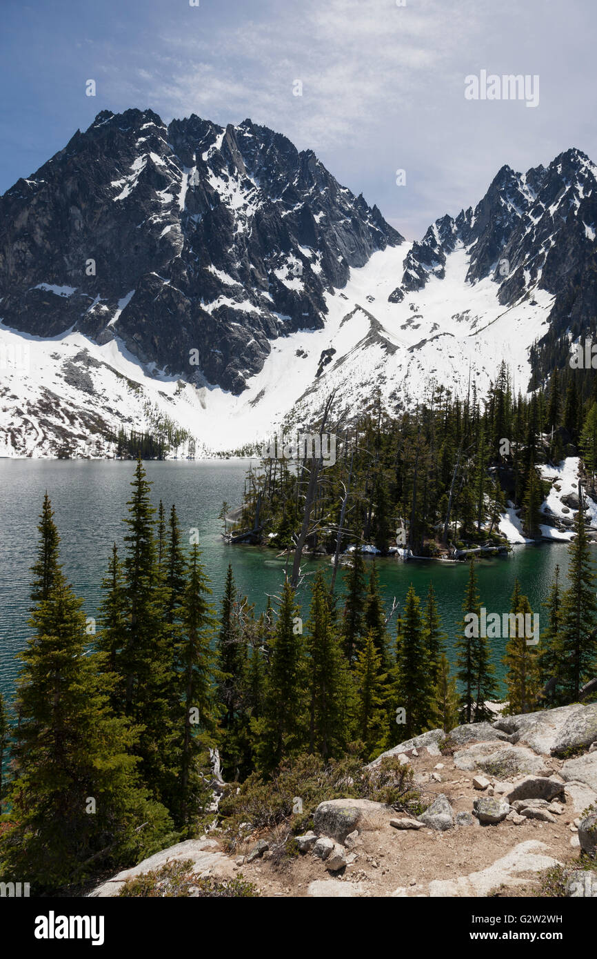 Alpine Lakes Wilderness, Washington: Colchuck Lake with Dragontail and Colchuck Peaks. Stock Photo