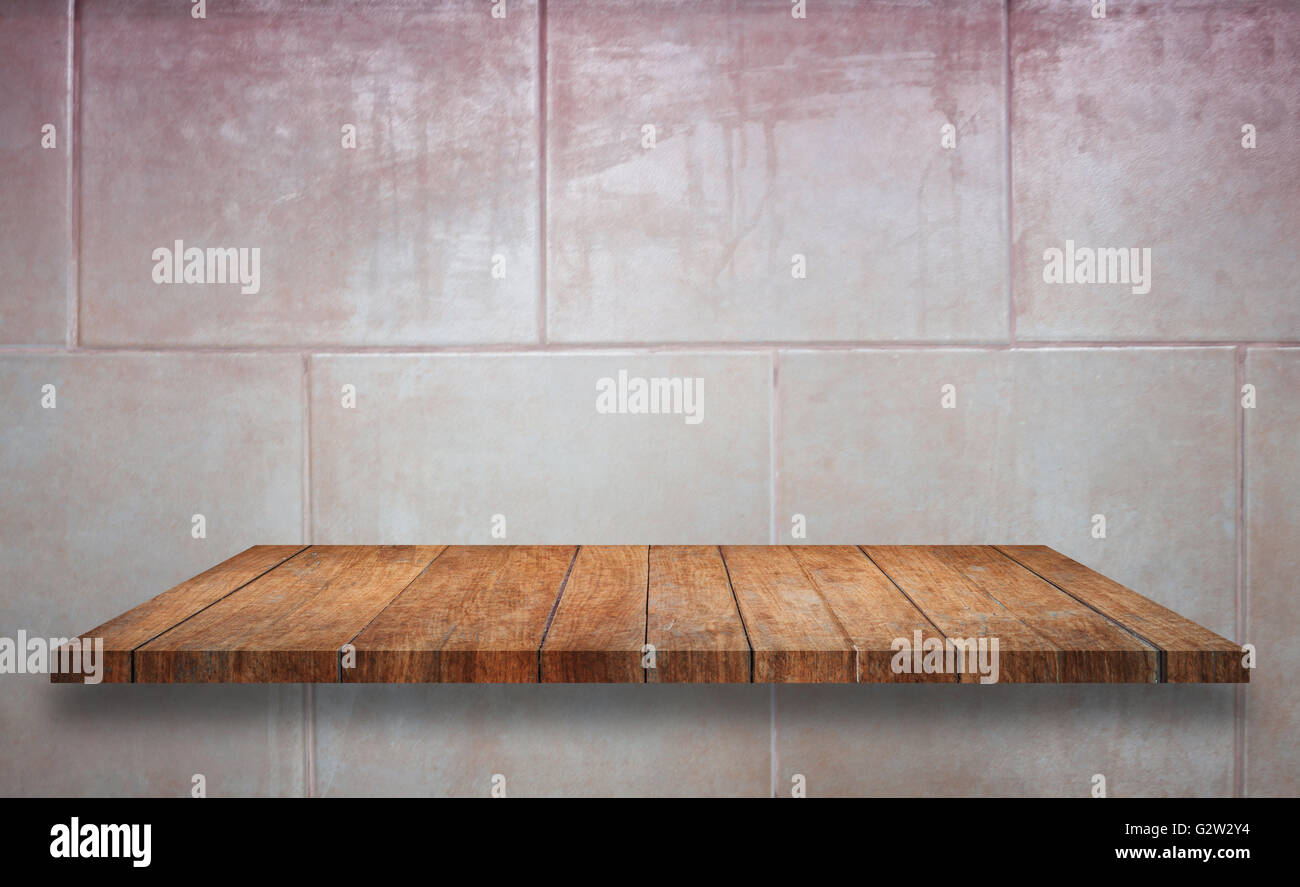 Top of wooden shelf on ceramic tiles wall texture background, stock photo Stock Photo