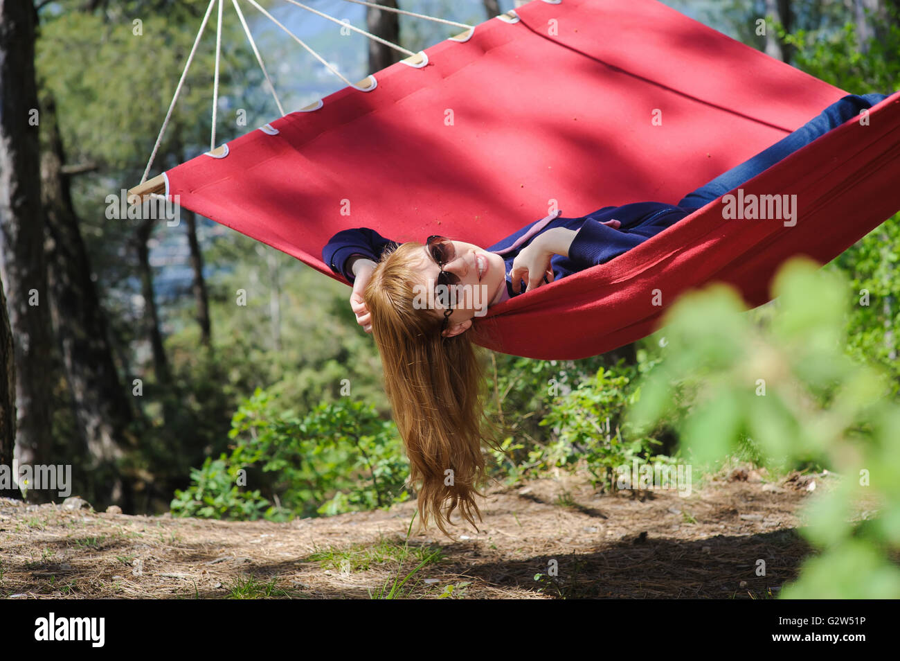 Happy Girl Relaxing In Hammock Stock Photo - Alamy