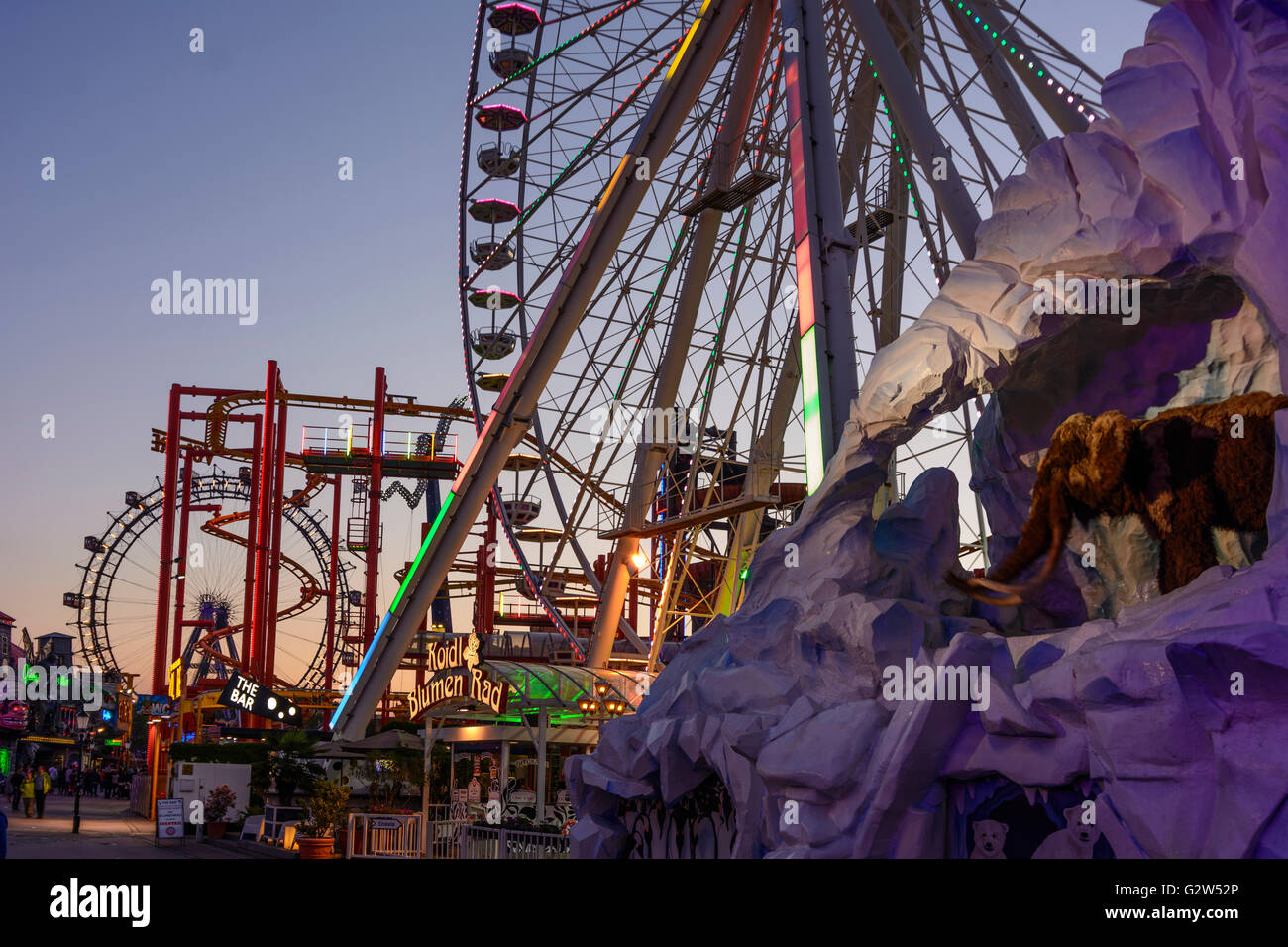 Prater with ferris wheel , flower wheel and attraction Iceberg, Austria, Vienna, Wien Stock Photo