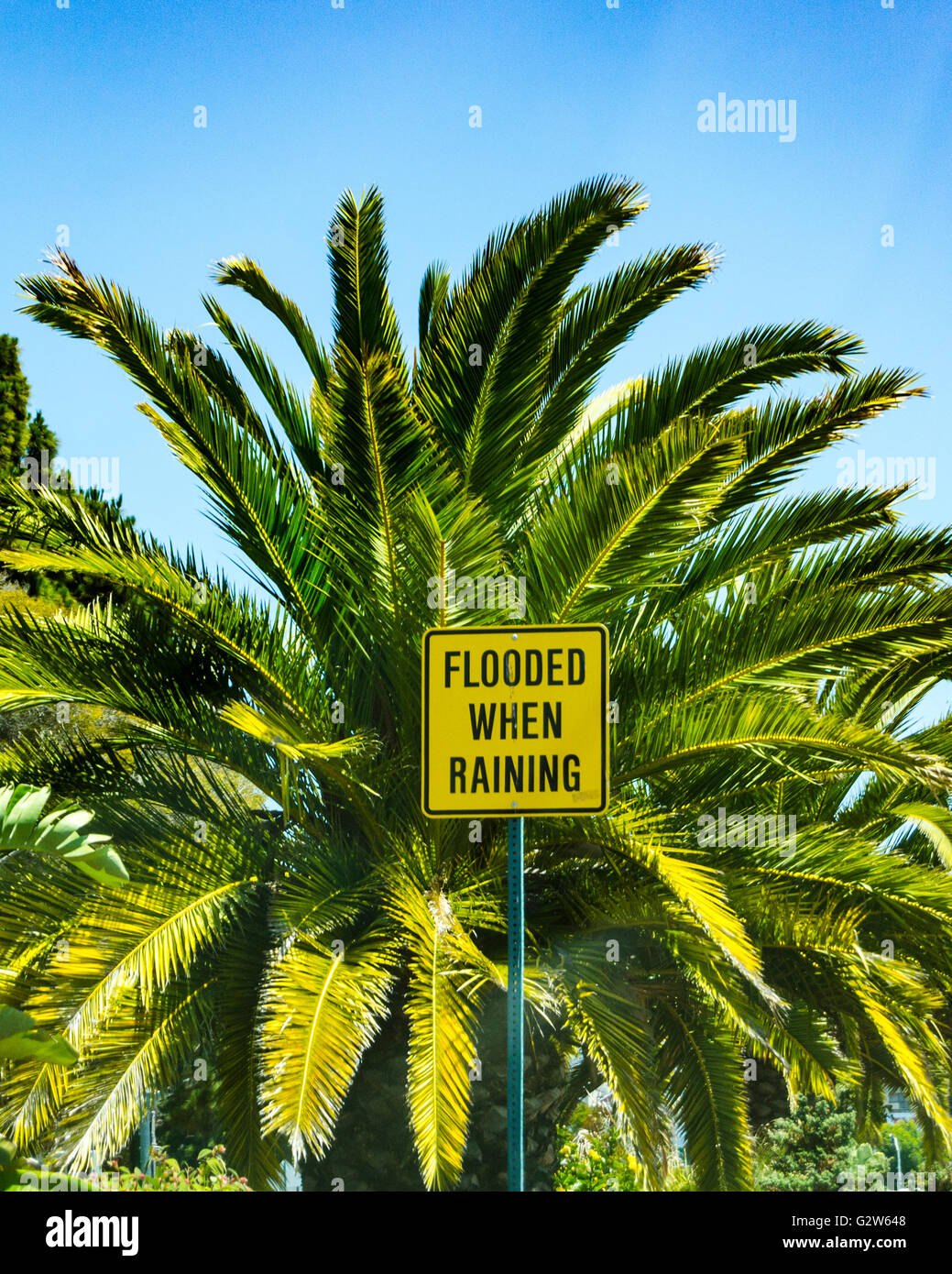 A flooded when raining sign in Emeryville California on Powell Street by the San Francisco Bay Stock Photo