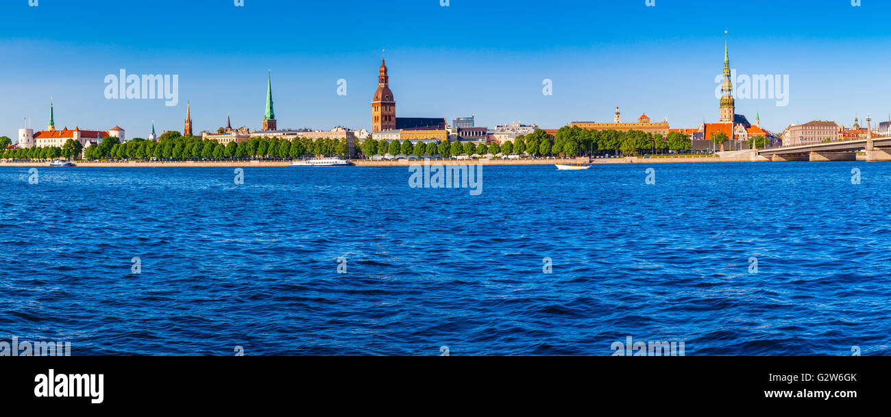 Panoramic view on the embankment of the Daugava River: Riga castle, Riga Cathedral, Saint Peters Church. Latvia. Stock Photo