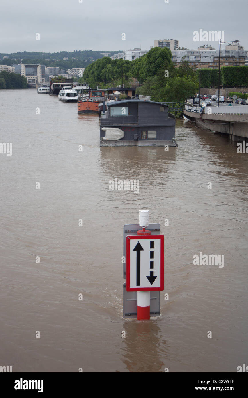 Flood waters around l'Ile Saint Germain causing problems for houseboats and waterfront businesses. Stock Photo