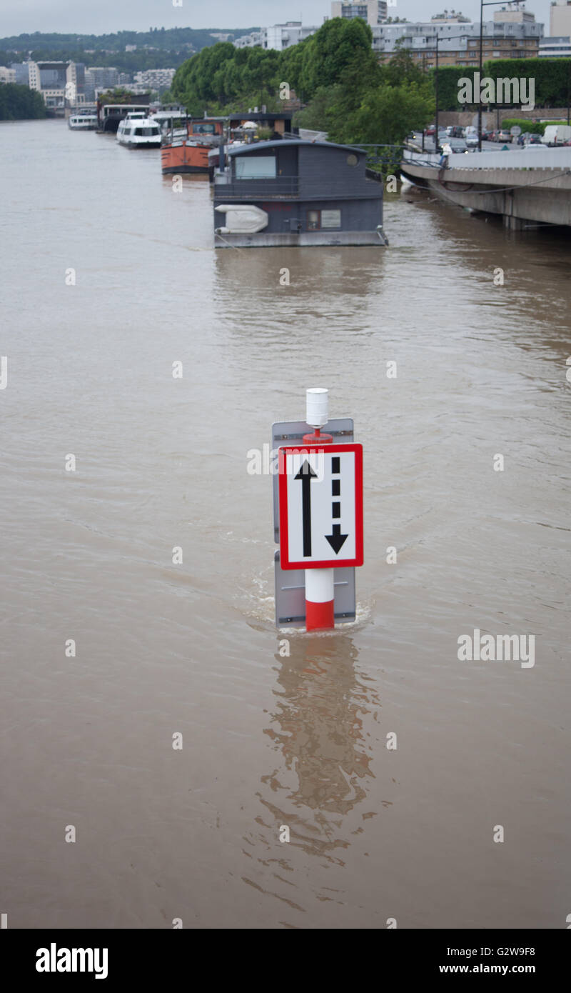 Flood waters around l'Ile Saint Germain causing problems for houseboats and waterfront businesses. Stock Photo