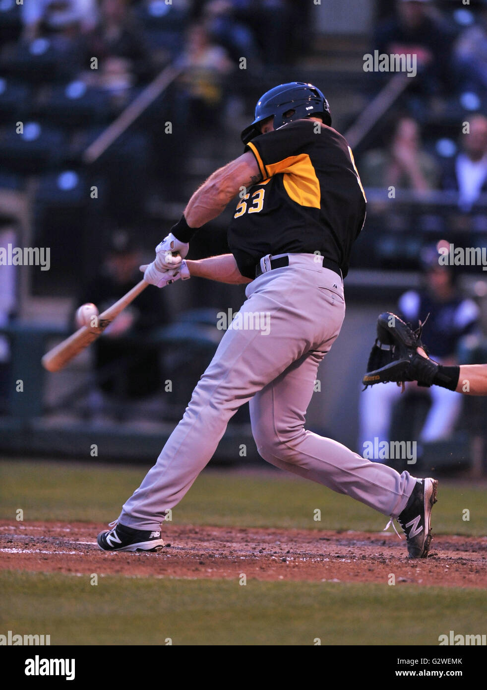 Salt Lake Bees catcher Erik Kratz (53) connects for a base hit in a game against the Tacoma Rainiers. Tacoma won the game 6-1, which was played at Cheney Stadium, Tacoma, WA. Jeff Halstead/Cal Sport Media © Jeff Halstead/CSMedia Stock Photo