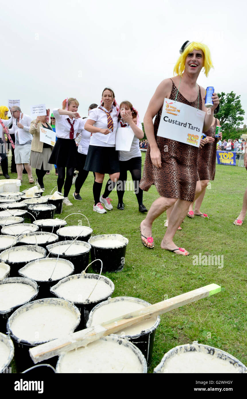 Coxheath, Kent, England, 4th June 2016. Teams of four compete at the official World Custard Pie Championship 2016 in the village of Coxheath near Maidstone, Kent. Started in 1967 by councillor Mike FitzGerald as a way to raise money for the village hall, the event has become an international sporting fixture with a team from Japan winning in 2015. http://www.worldcustardpiechampionship.co.uk/ Credit:  PjrNews/Alamy Live News Stock Photo