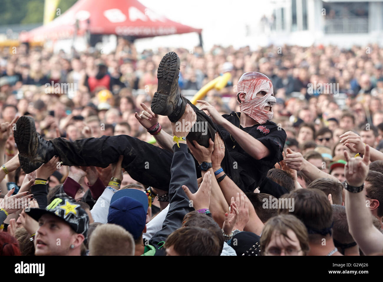 Mendig, Germany. 03rd June, 2016. A stage diver is carried by the crowd  during the performance of US metal band Disturbed at the 'Rock am Ring' ( Rock at the Ring) music festival