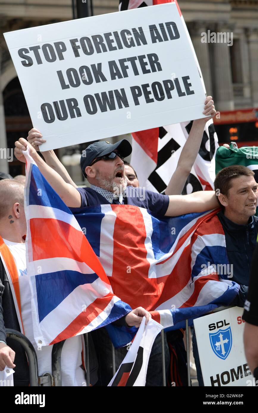 Glasgow, Scotland, UK. 04th June, 2016. Supporters of the Scottish Defence League held a demonstration in George Square, Glasgow which demanded a large police presence. A counter demonstration by various union groups and left wing anti-Nazi lobbyists were also in the square in the heart of the city. Alamy Live News Stock Photo