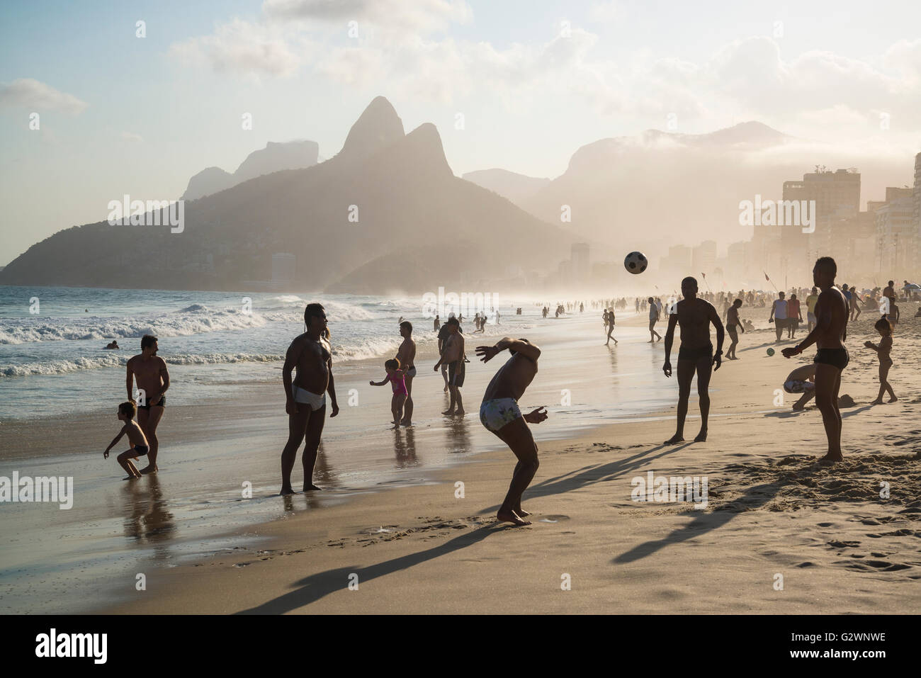 People playing ball game Ipanema beach, Rio de Janeiro, Brazil Stock Photo