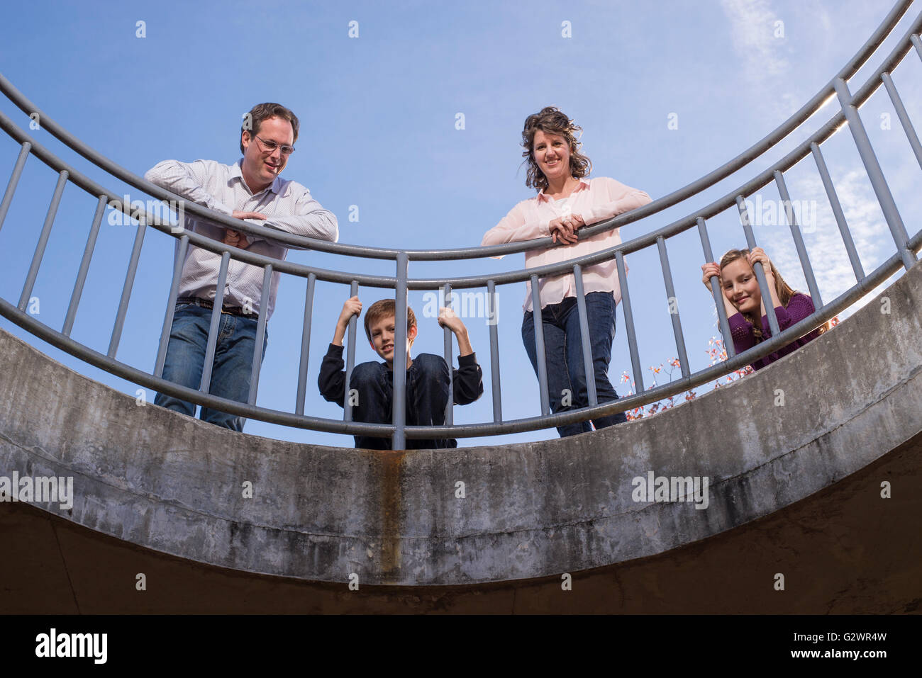 A Caucasian family of four pose for photographs at JC Arboretum in Raleigh, NC, USA. Stock Photo