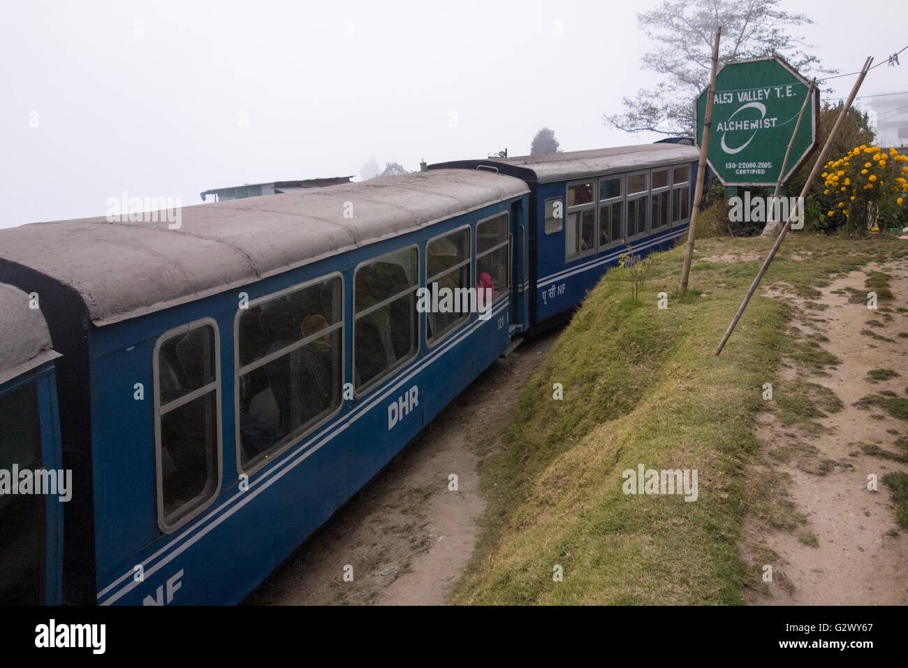 Darjeeling Himalayan Railway Toy Train waiting for crossing at Rongbull Siding Stock Photo