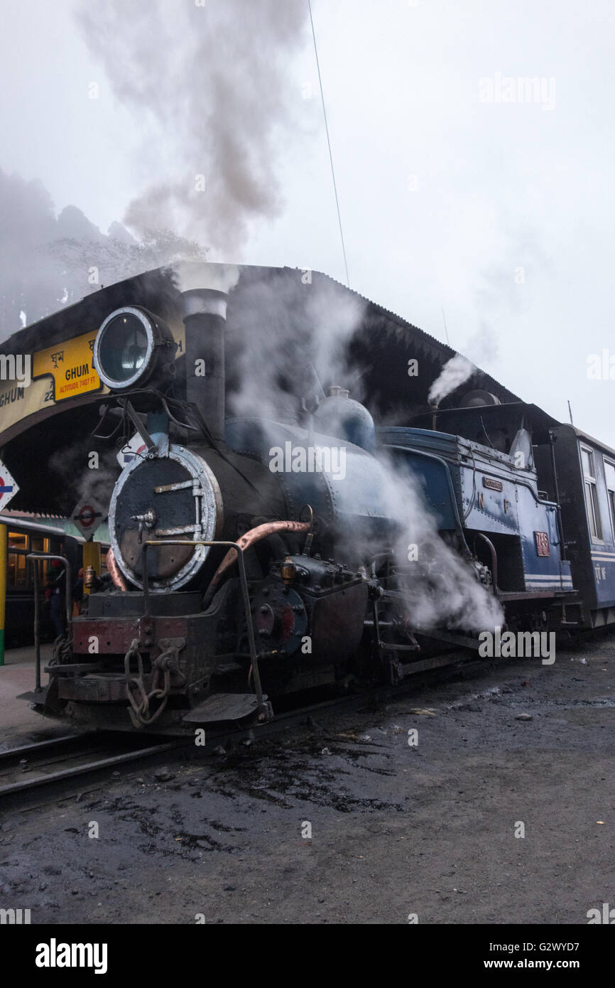 Steam Locomotive of Darjeeling Himalayan Railway resting at Ghum railway station, the highest railway station in India. Stock Photo