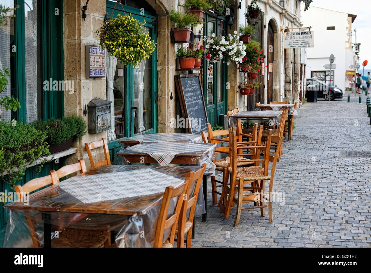 The outdoor cafe decorated with flowers in pots. Larnaca, Cyprus Stock