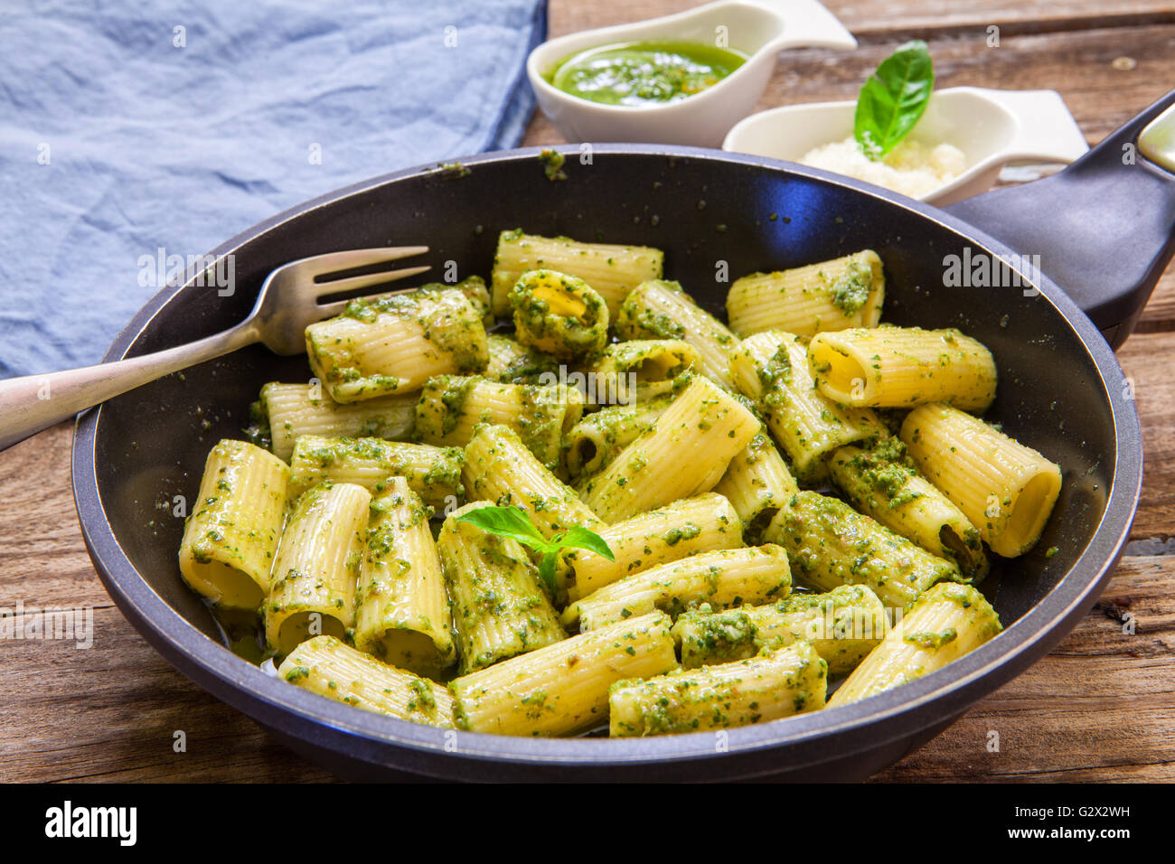 rigatoni with pesto sauce and cheese Stock Photo Alamy