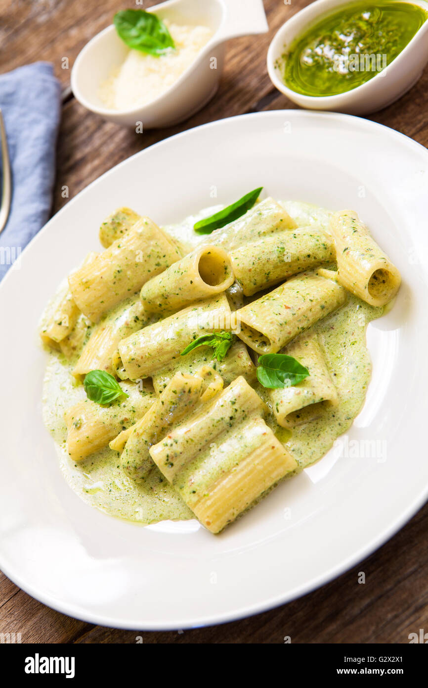 rigatoni with pesto sauce and cheese Stock Photo Alamy