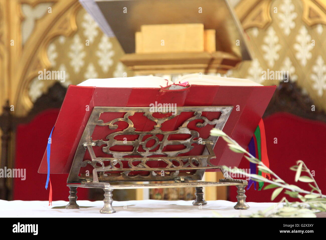 Old lectern with a red book Stock Photo