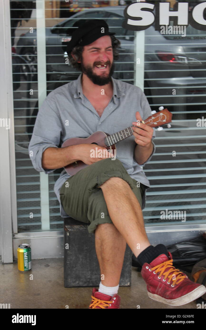 South Congress (Austin, TX).   Man singing and playing his Ukulele. Stock Photo