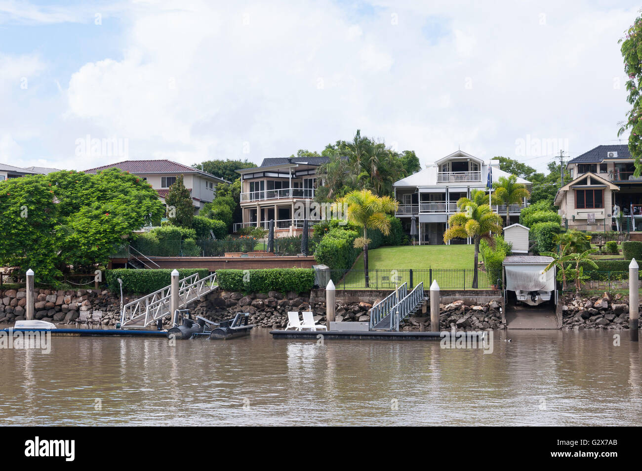 Luxury riverside houses on Brisbane River, Fig Tree Pocket, Brisbane, Queensland, Australia Stock Photo