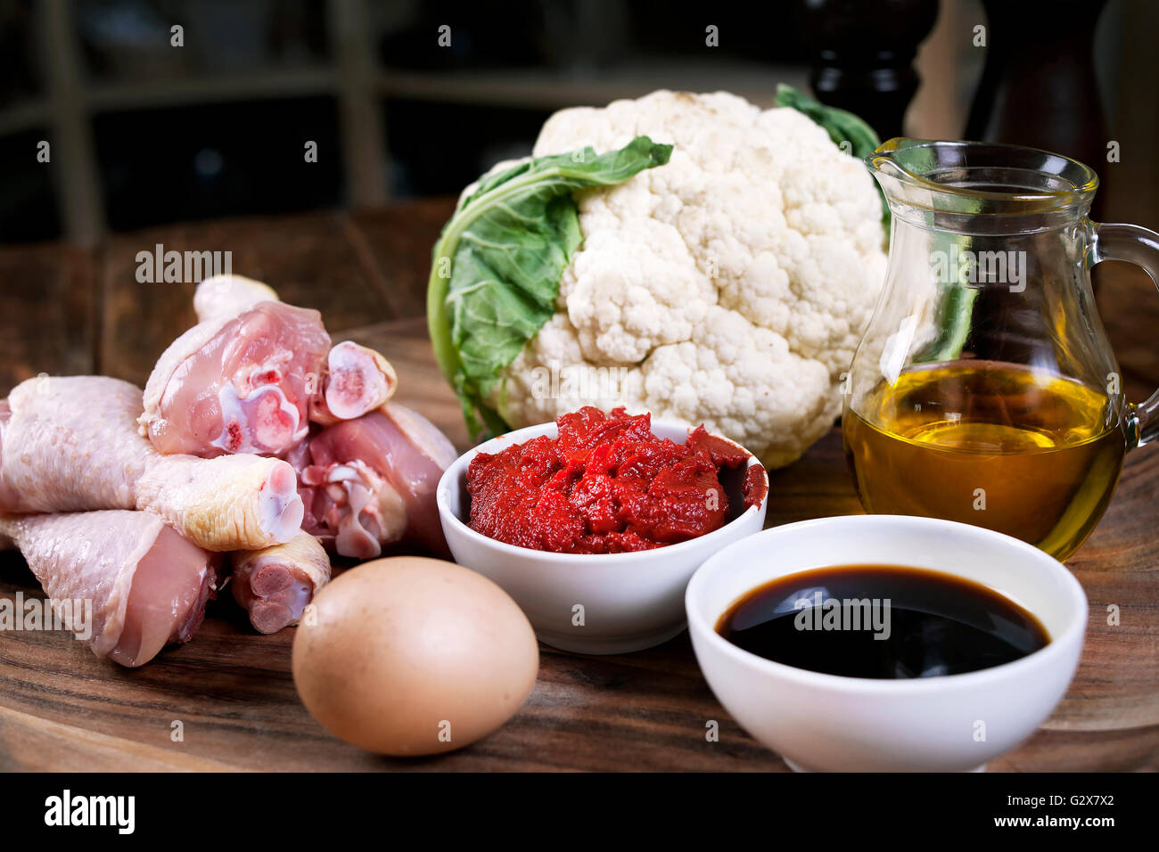 Cauliflower with chicken legs. Cooking. Recipe Stock Photo