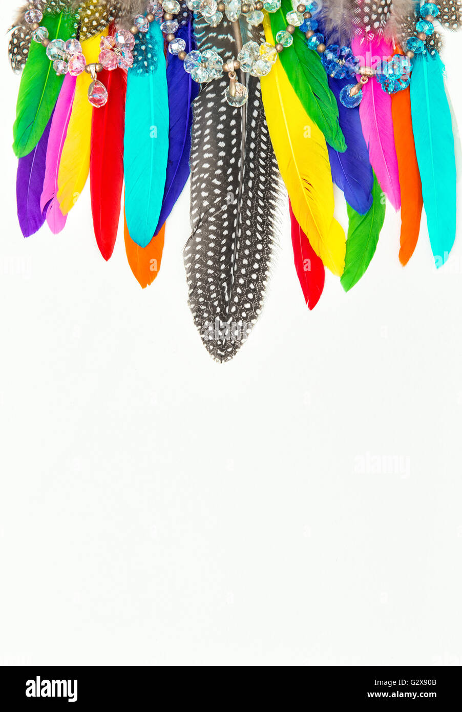 Colorful feathers and gemstones. Boho style decoration Stock Photo