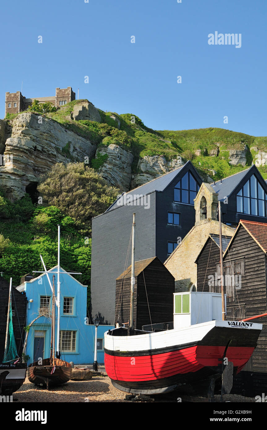 The Stade at Hastings, East Sussex UK, with net sheds and East Hill in background Stock Photo