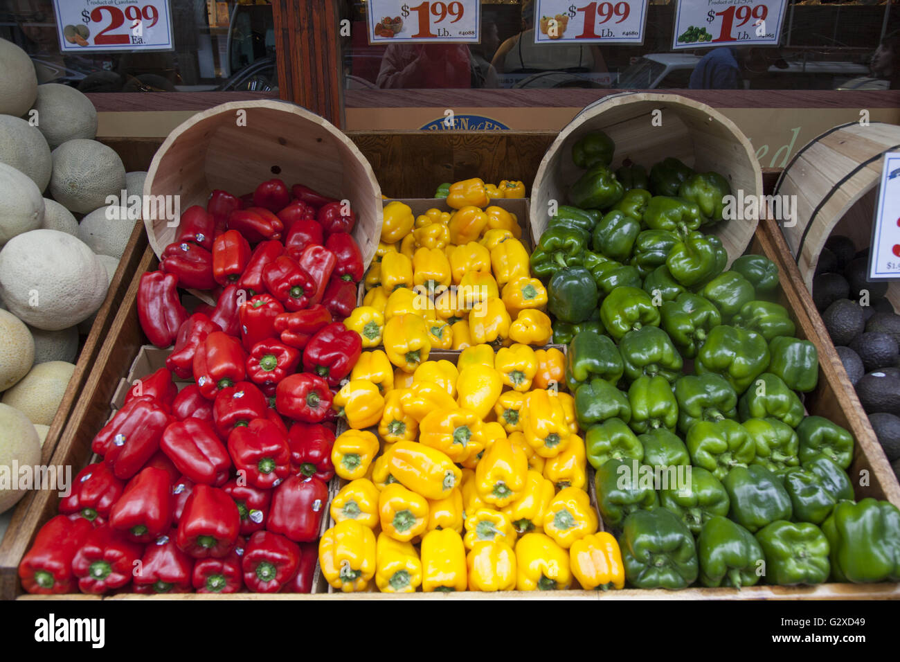 A rainbow of bell peppers for sale at a produce store in Manhattan, NYC. Stock Photo