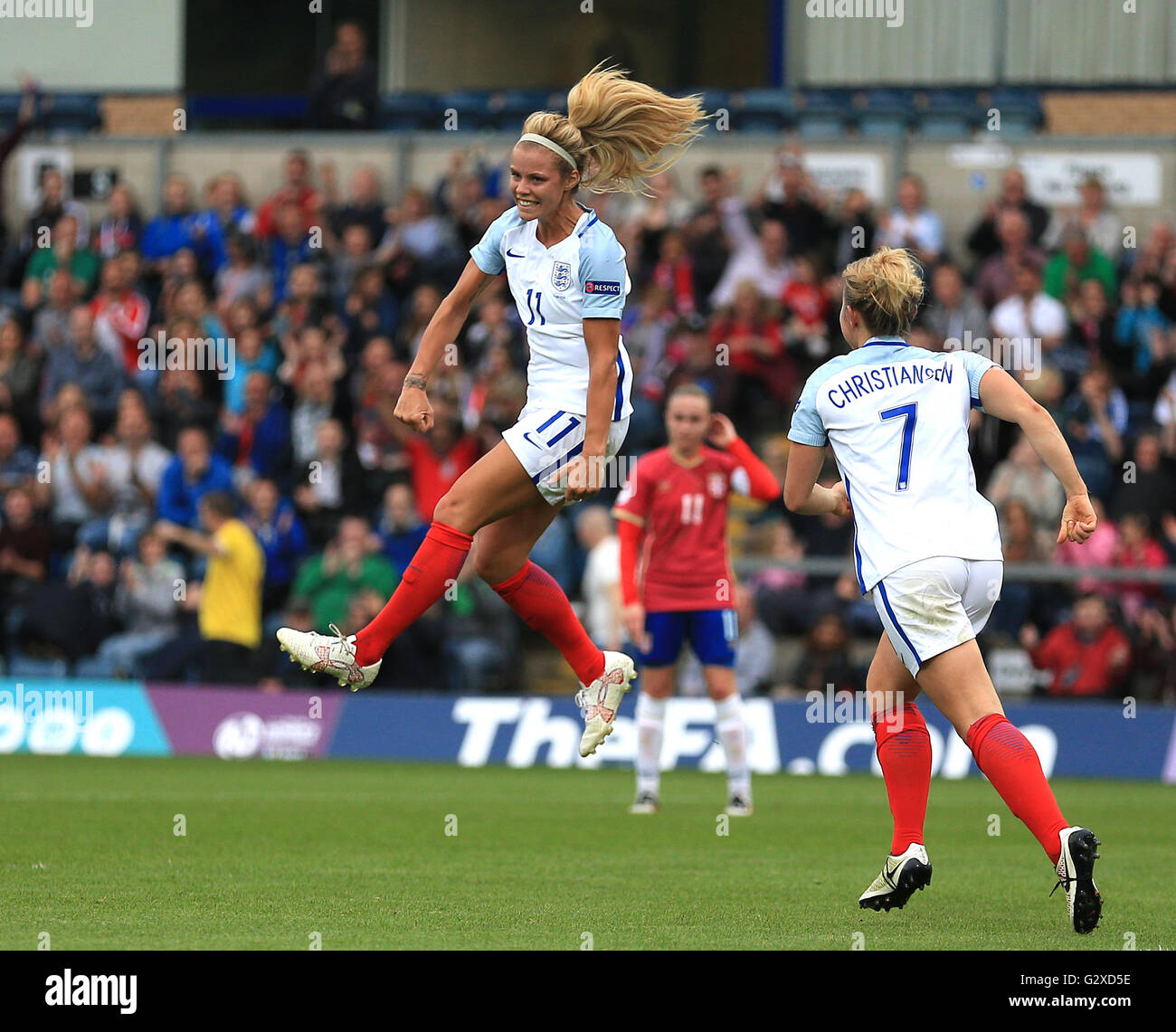 England's Rachel Daly (left) celebrates after scoring her sides third ...