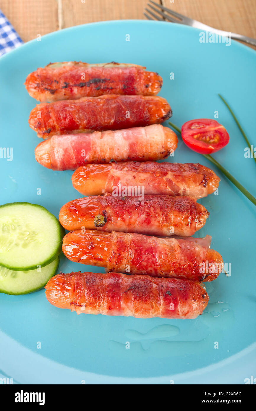 Sausages with bacon Stock Photo Alamy