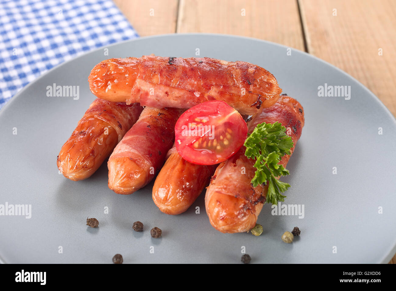 Sausages with bacon Stock Photo Alamy