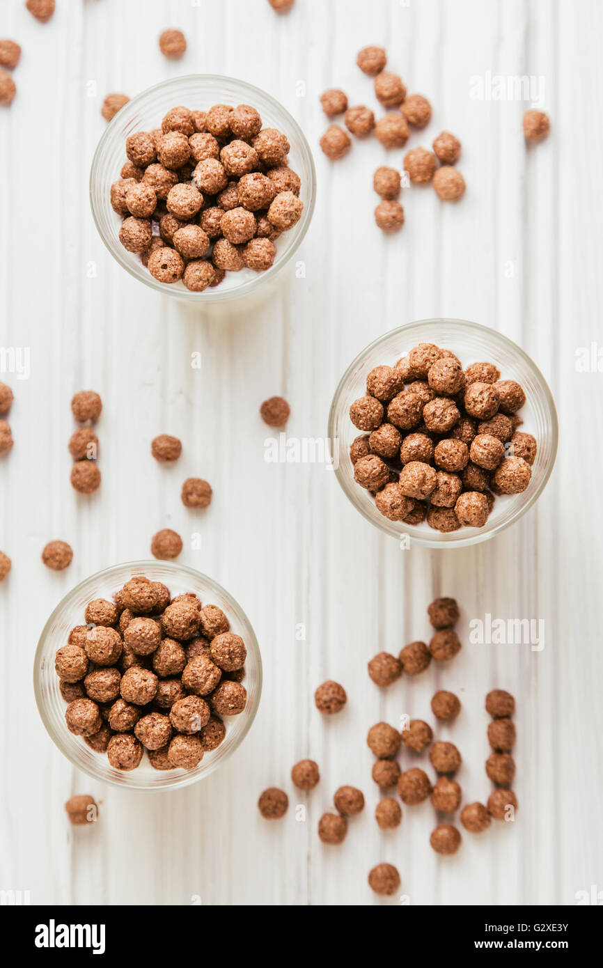 Chocolate cereal balls with milk Stock Photo Alamy