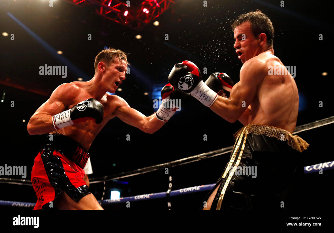 Thomas Stalker (left) fights Antonio Joao Bento at the Echo Arena, Liverpool. Stock Photo