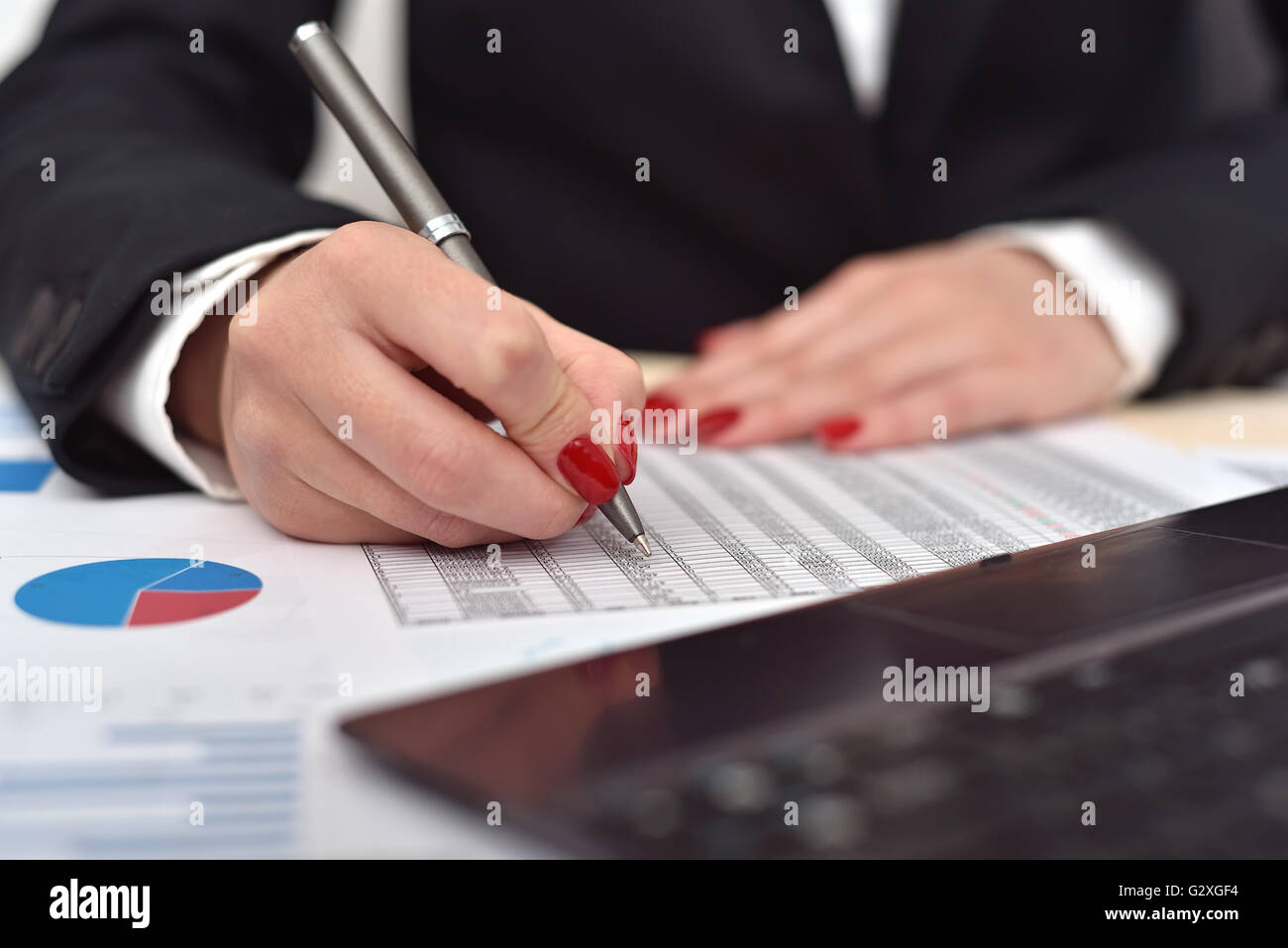 businesswoman checks the start up report. close up Stock Photo