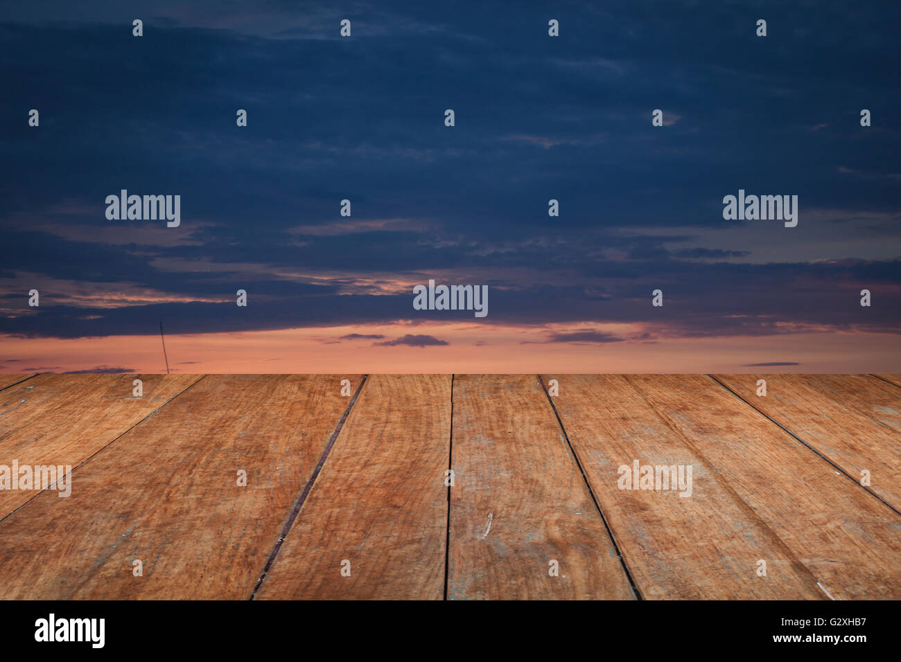 Perspective top wooden with sunrise on the lake with beautiful sky Stock Photo