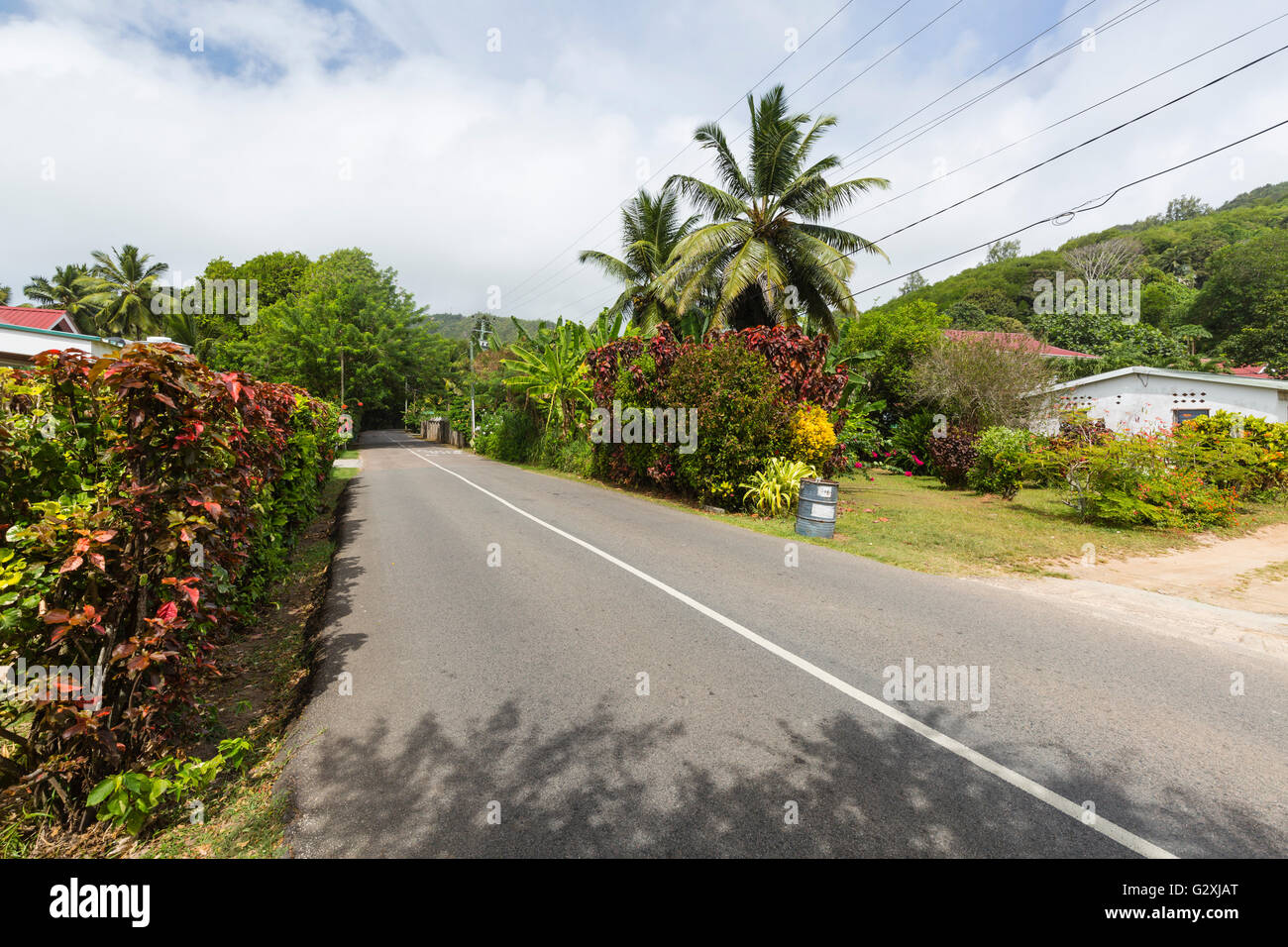 The South Coast Road at Anse Forbans in the south of Mahe, Seychelles Stock Photo